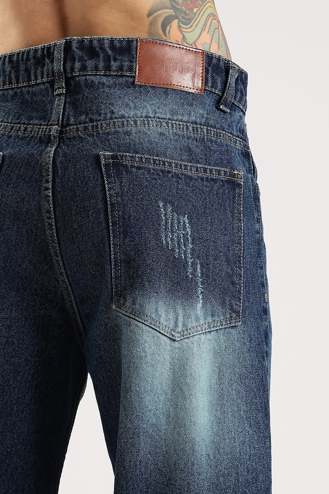 SCRATCHY DARK BLUE JEANS