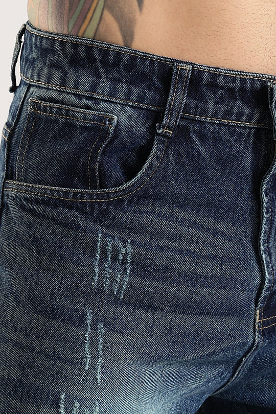 SCRATCHY DARK BLUE JEANS